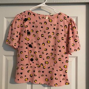 Peplum style leopard top